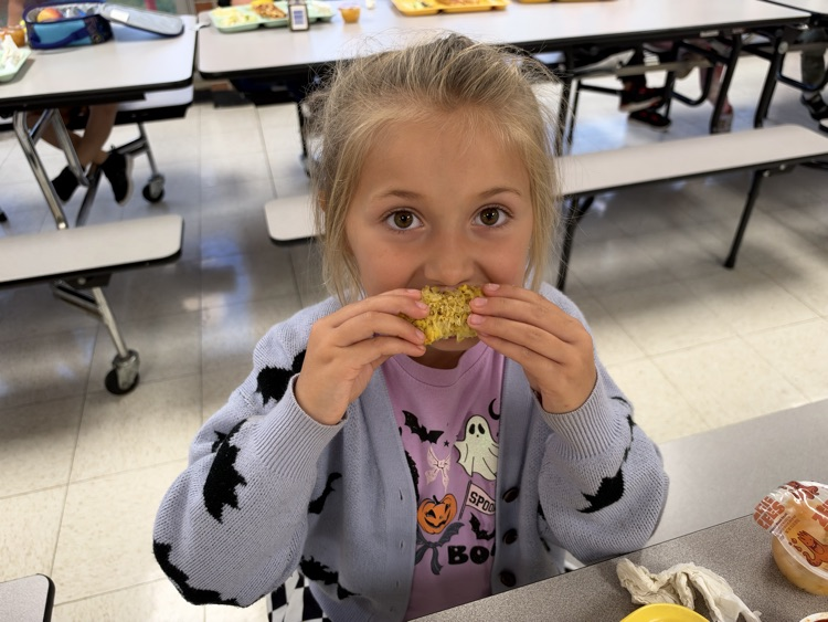 students eating corn
