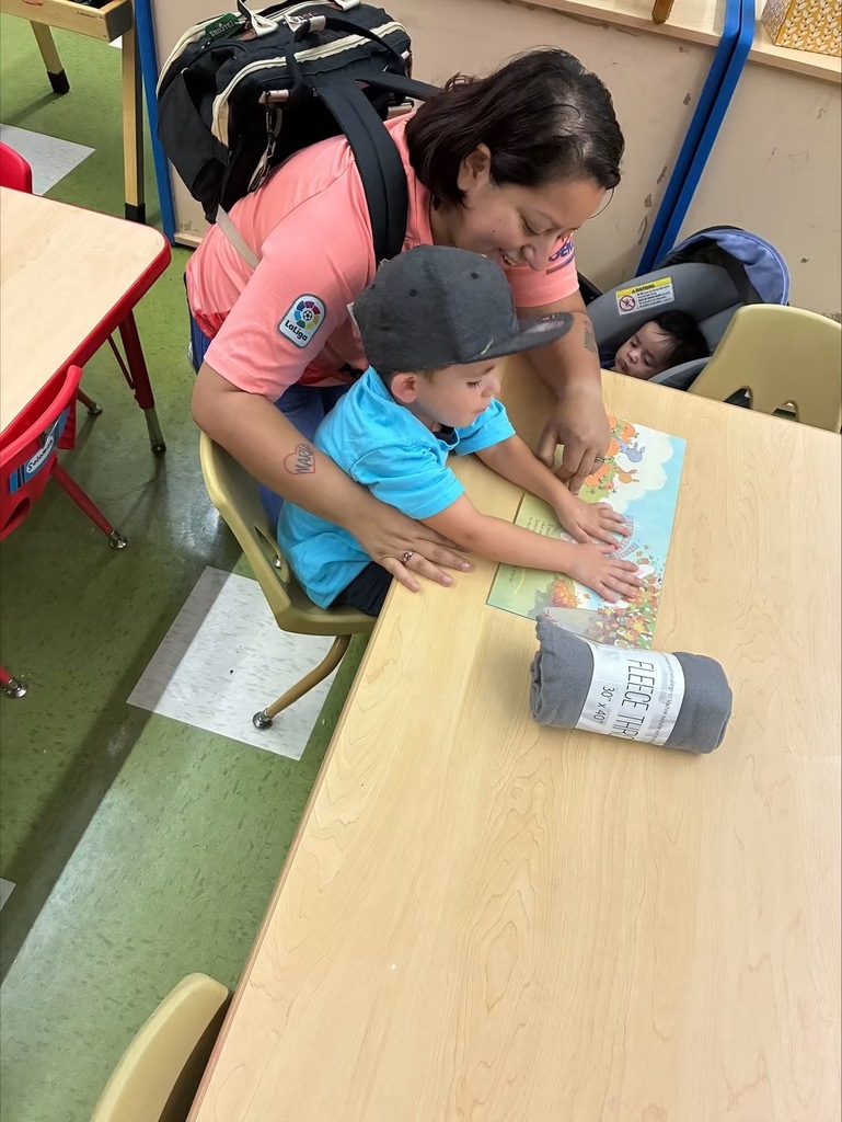 Mother reading to her preschooler