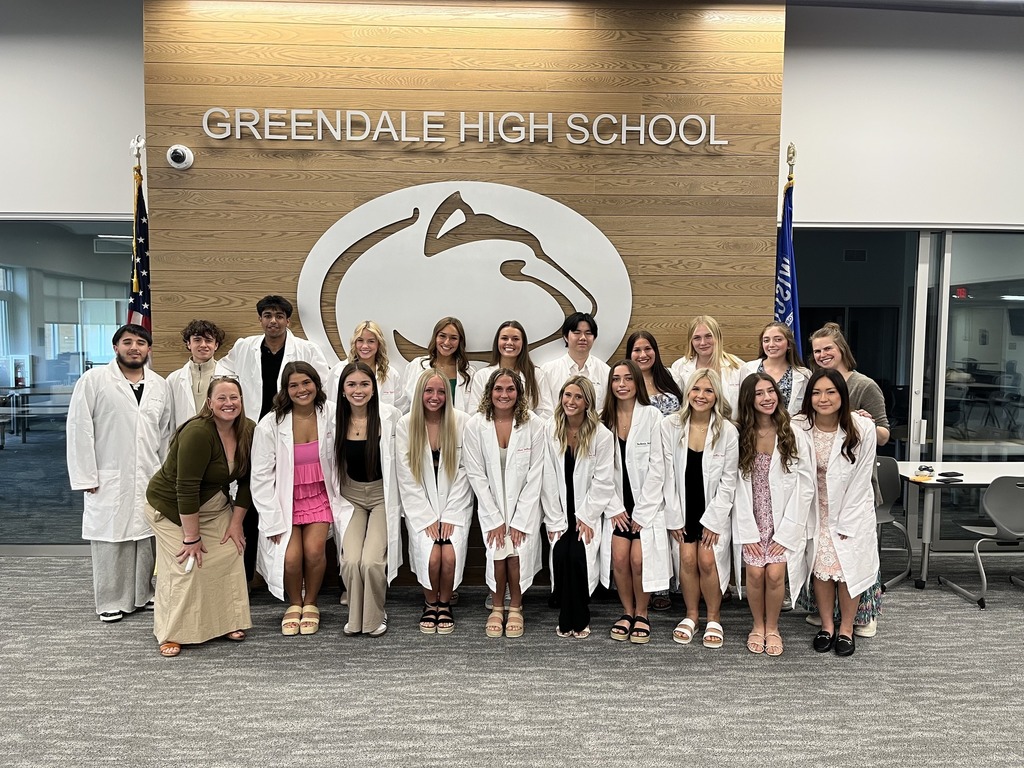 High School students and their teacher at the white coat ceremony