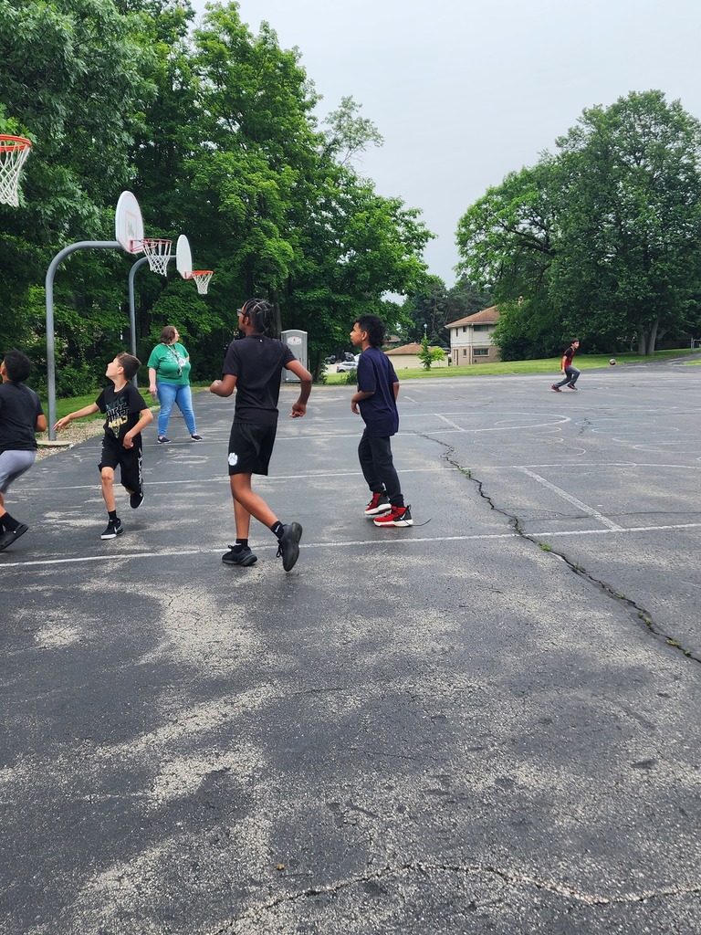 Students playing basketball