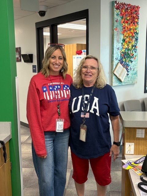 staff wearing red, white and blue for Patriot Day.