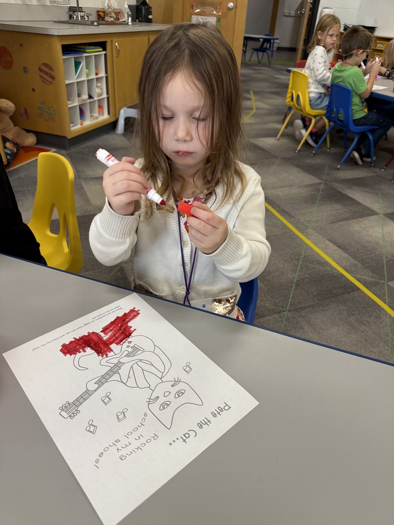 Child writing on paper