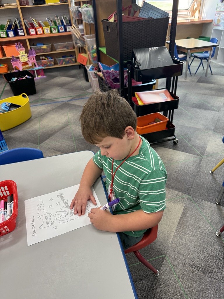Child writing on paper