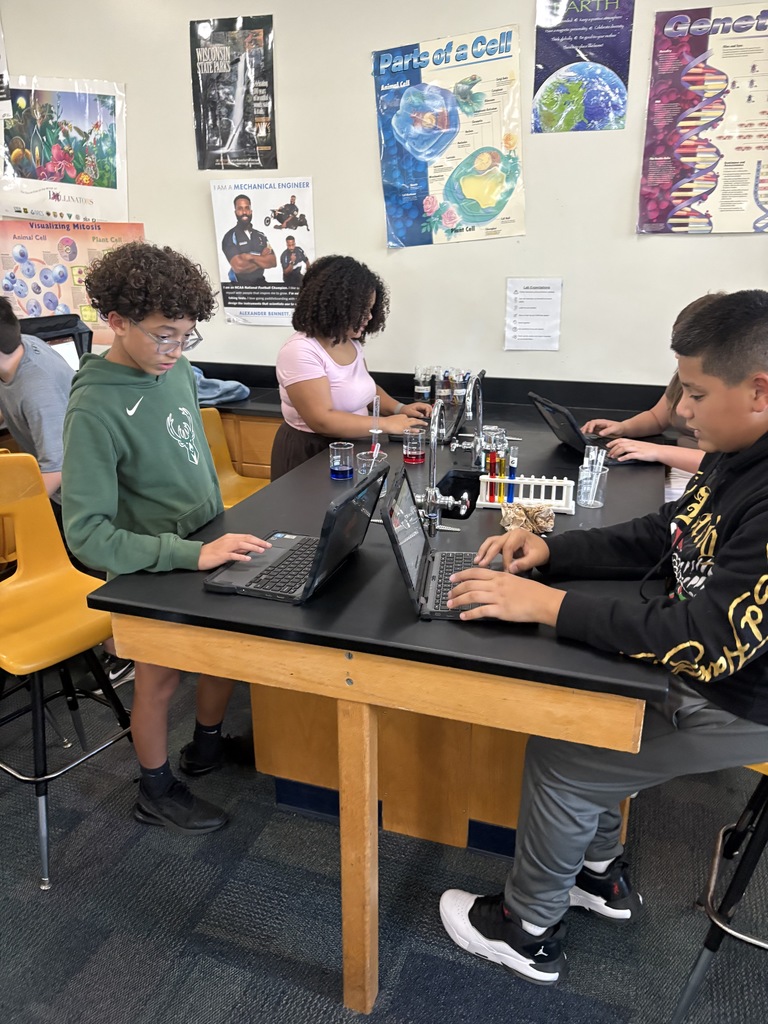 Seventh Graders Conducting First Lab of the School Year
