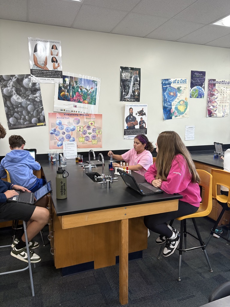 Seventh Graders Conducting First Lab of the School Year