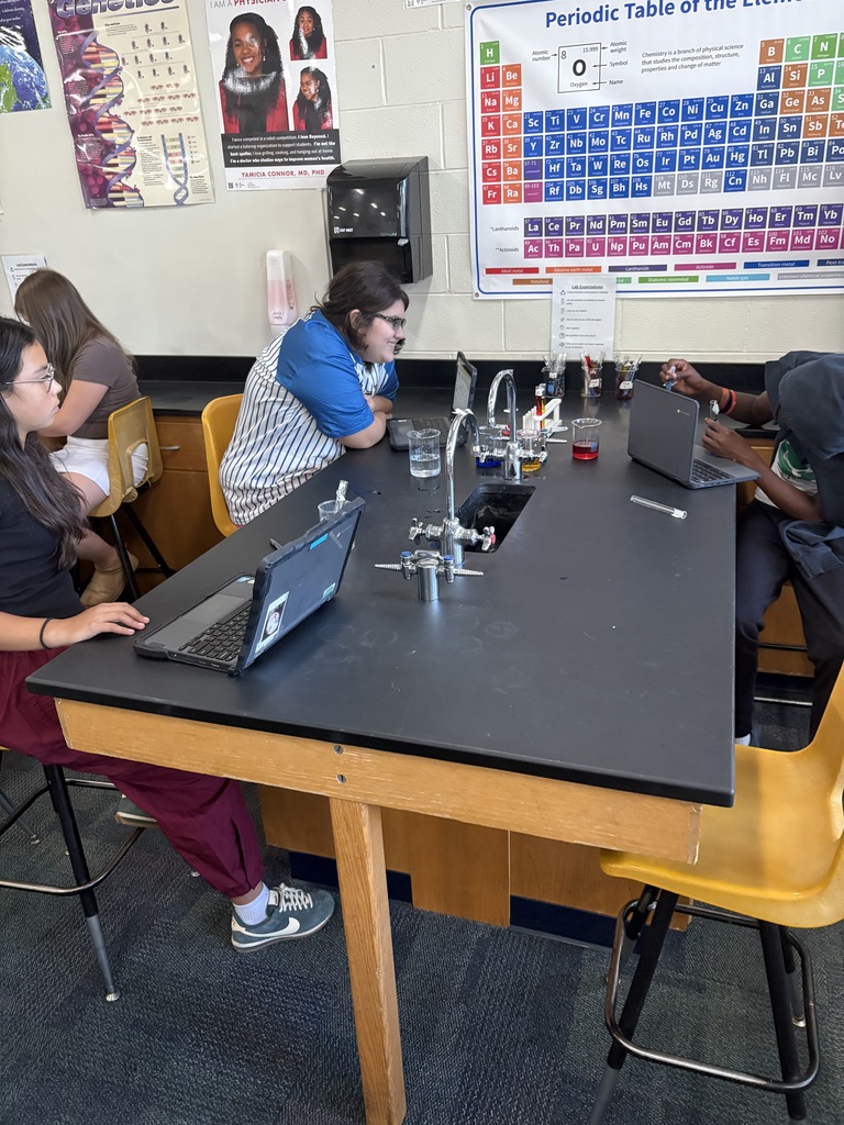 Seventh Graders Conducting First Lab of the School Year