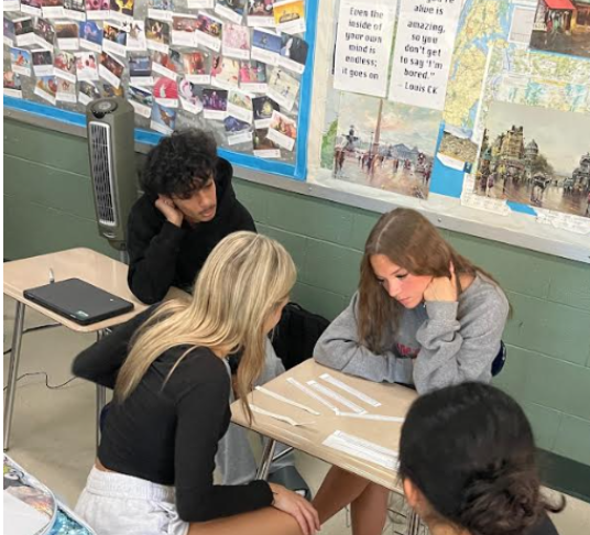 Students working on Outlook
