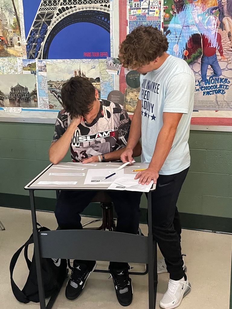 Students working on Outlook