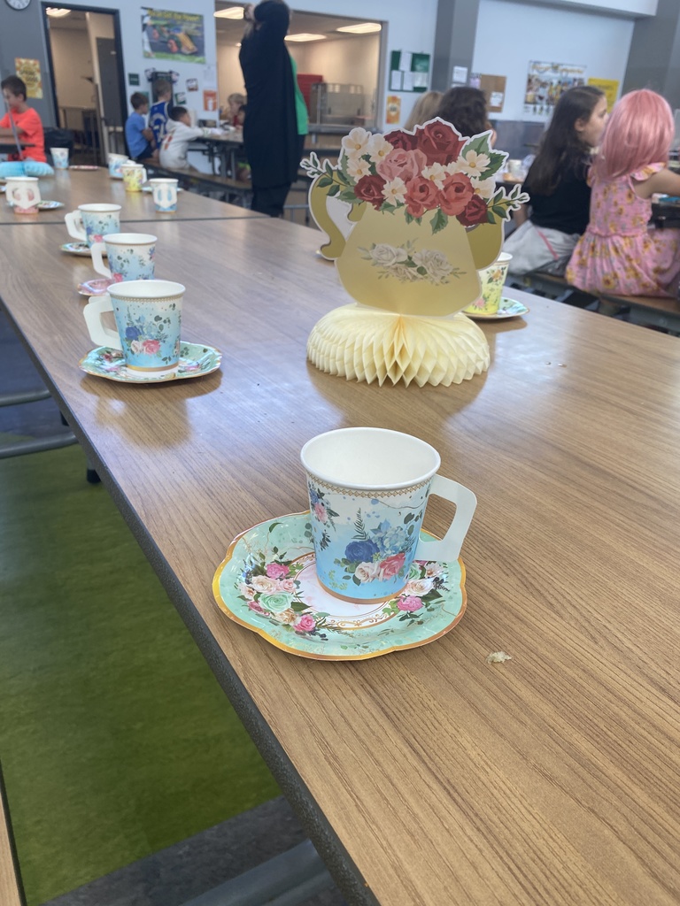 IMG_9295  Tea Cups at a tea party on a school lunch table