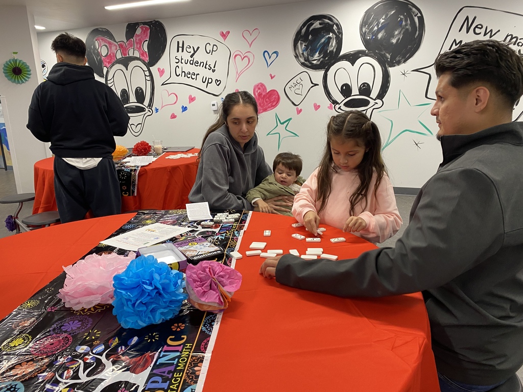 Playing Dominoes at Hispanic Heritage Night Celebration