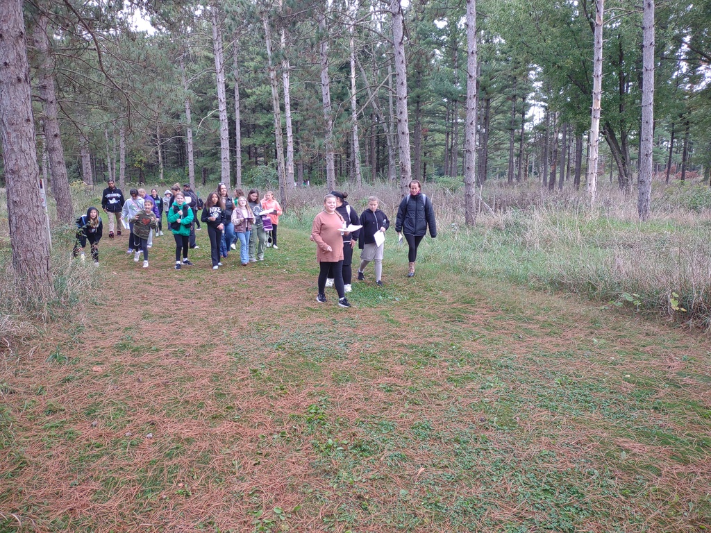 Students in field taking observations data.