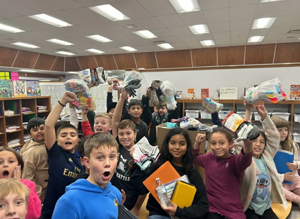 4th graders with Socktober donations.