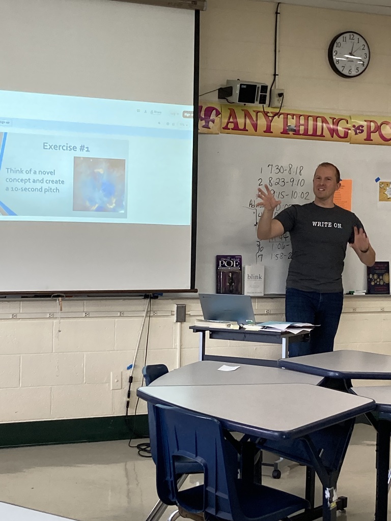 Closer view of Mr, Slater speaking to students in a classroom