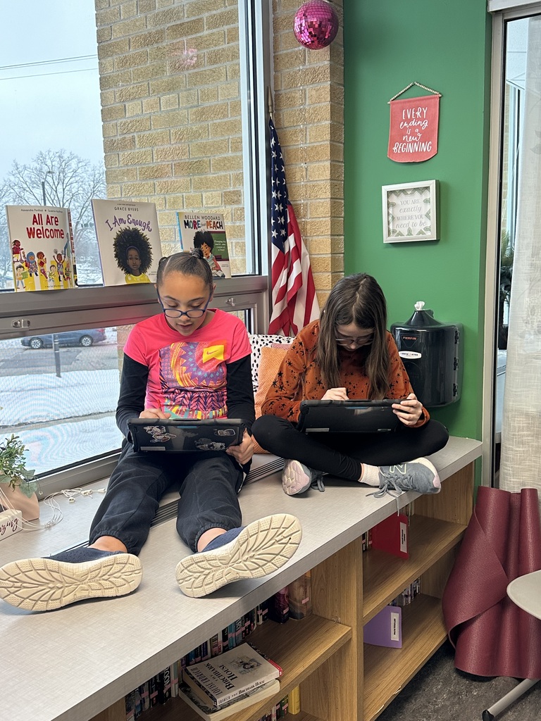 Hour of Code students working on a computer