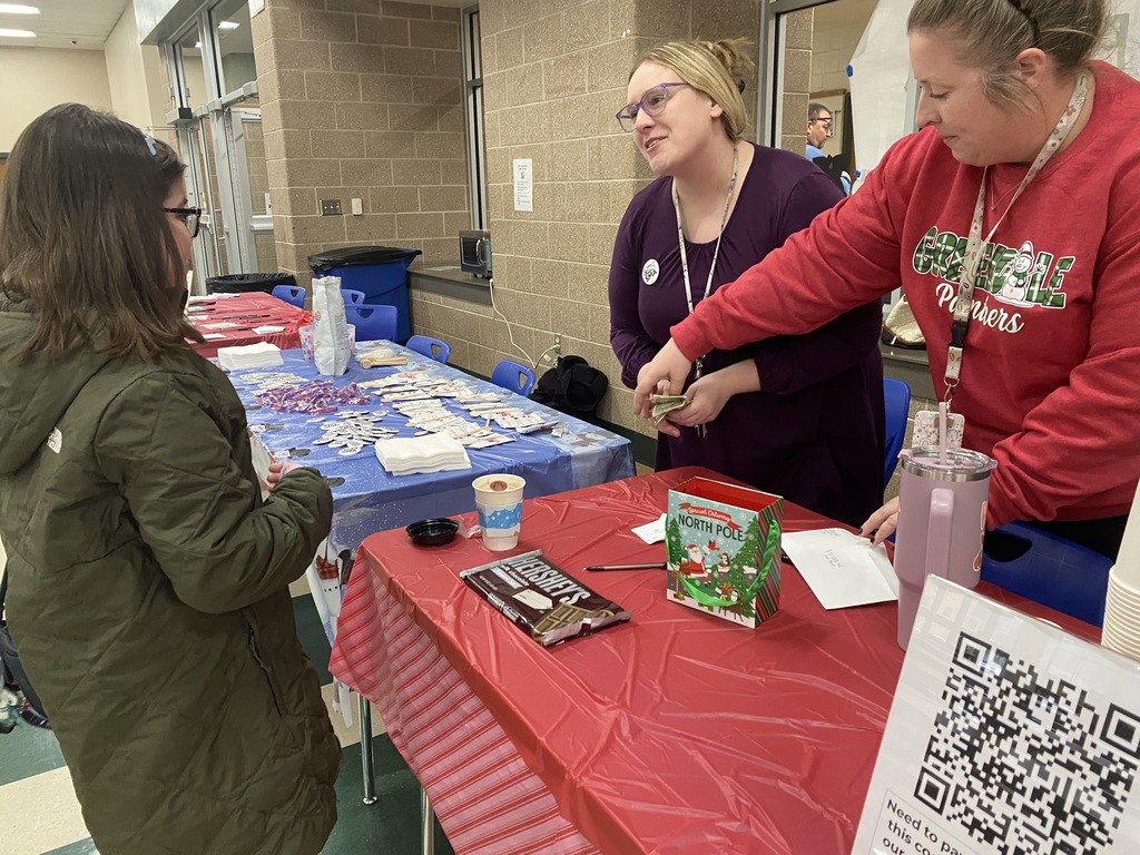 Student awaiting Hot Cocoa for Cure SMA fundraiser