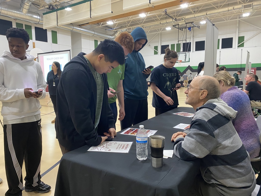 GHS Reality Check Day Students participating in personal finance activity