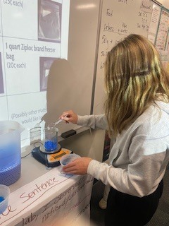 Seventh grade students creating flameless heaters in Science