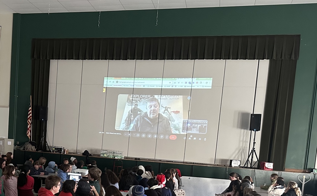 Students watching a video call with explorer_Mark_Wood
