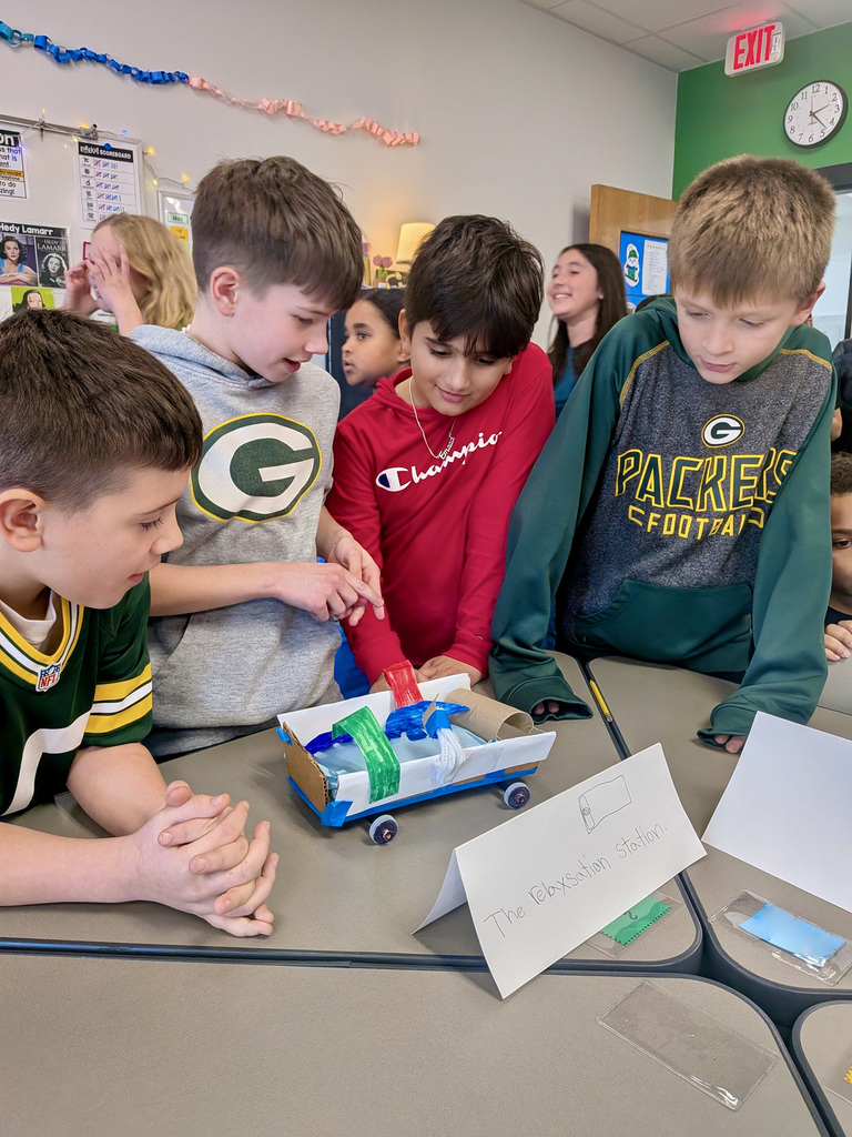 Students Showing Off Their Inventions