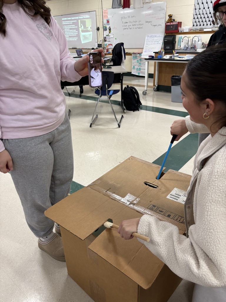 Students in PLTW Biomedical Innovations Simulate the Performing of Laparoscopic Surgery