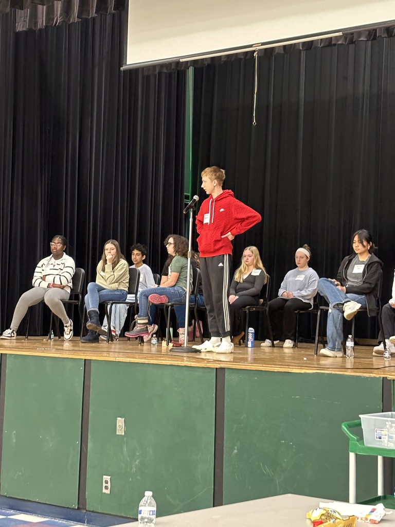 Spelling Bee student at microphone.