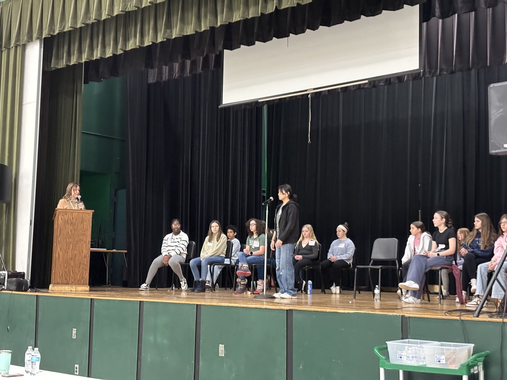 Spelling Bee student at microphone.