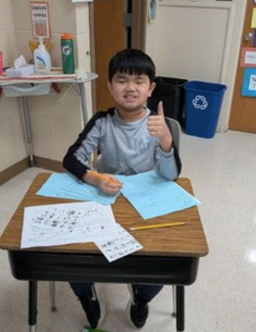 Canterbury Spanish Students Showing Off Their Work