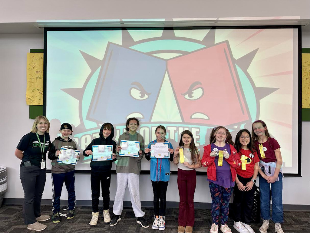Some Canterbury Battle of the Books participants posing with their certificates and ribbons.