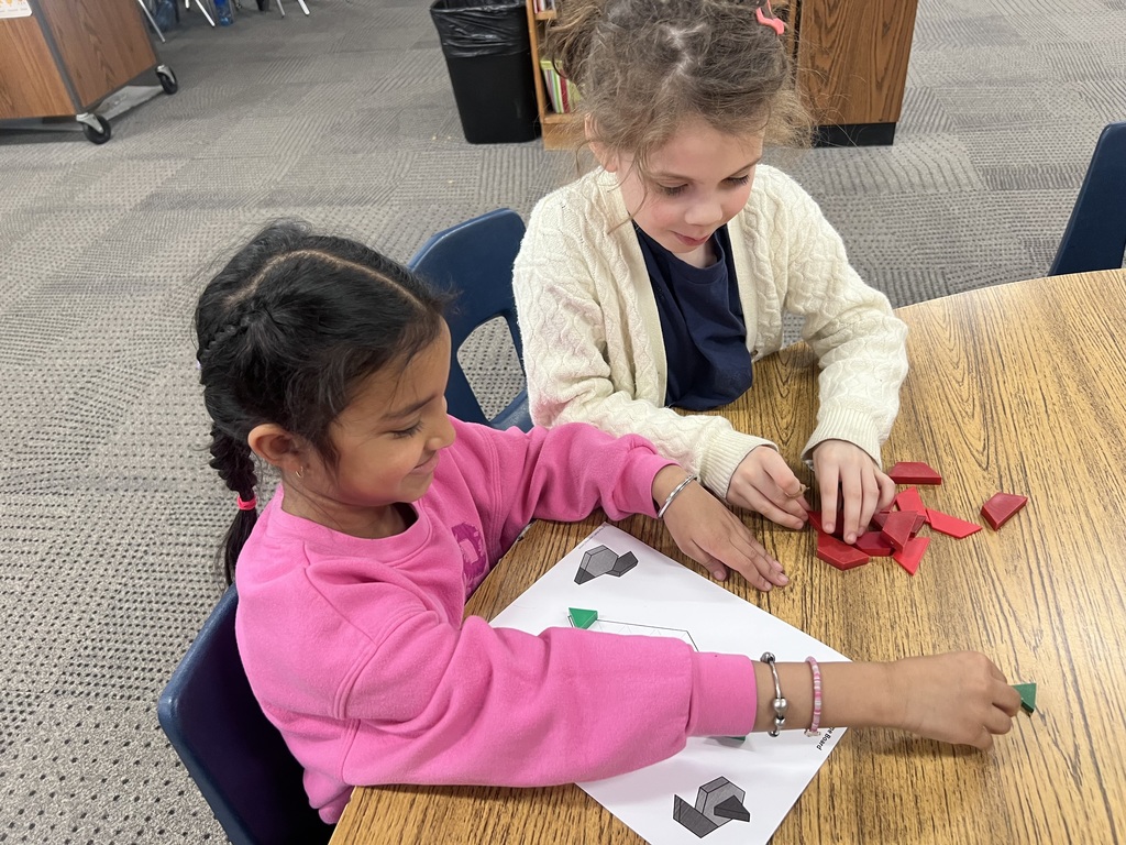 First Graders doing math lesson.