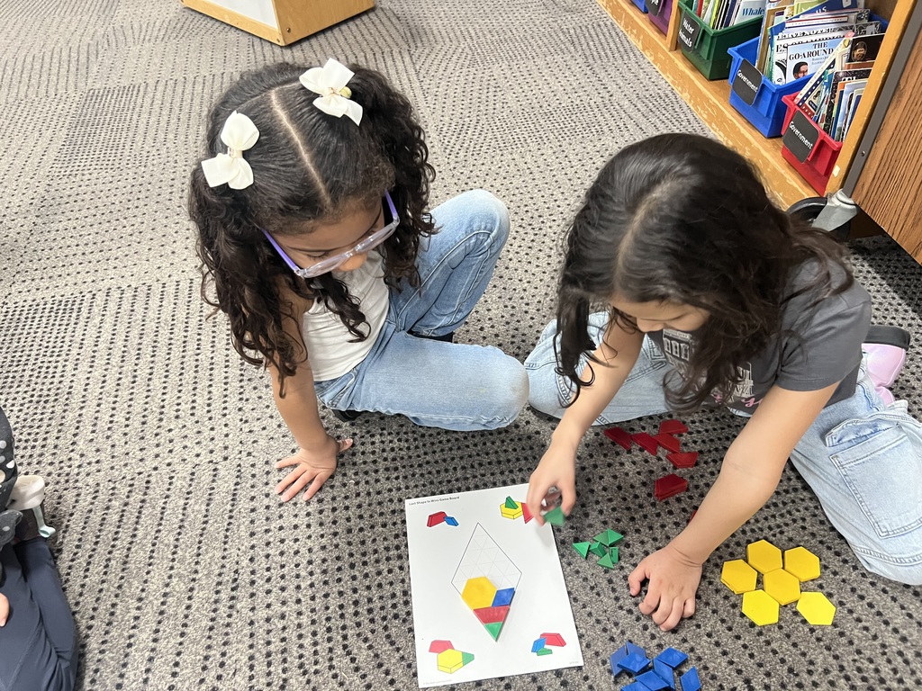 1st grade students doing math.