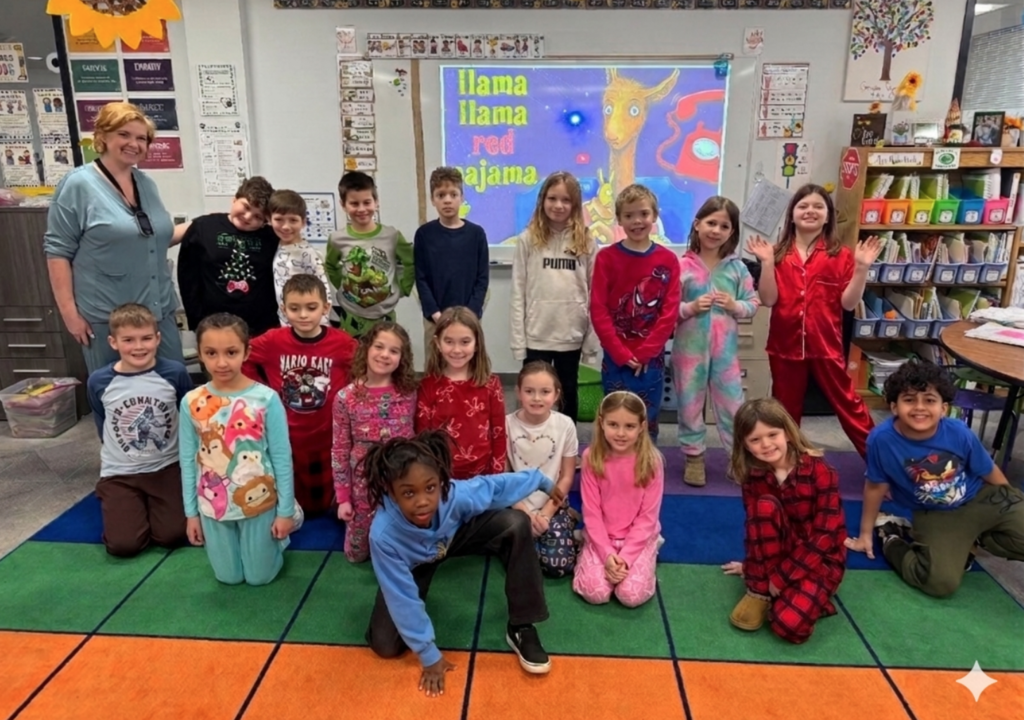 Class posing on spirit week Pajama Day.