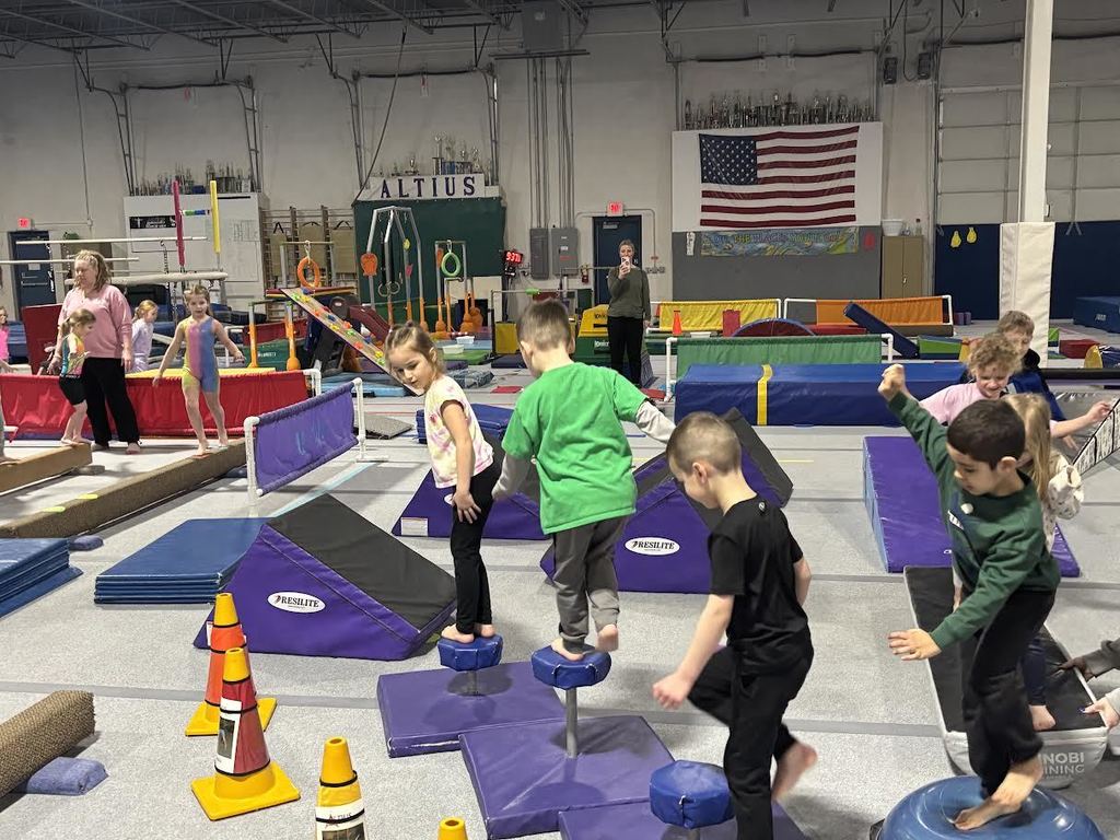 5K students enjoying and navigating an obstacle course at Altius Gymnastics.