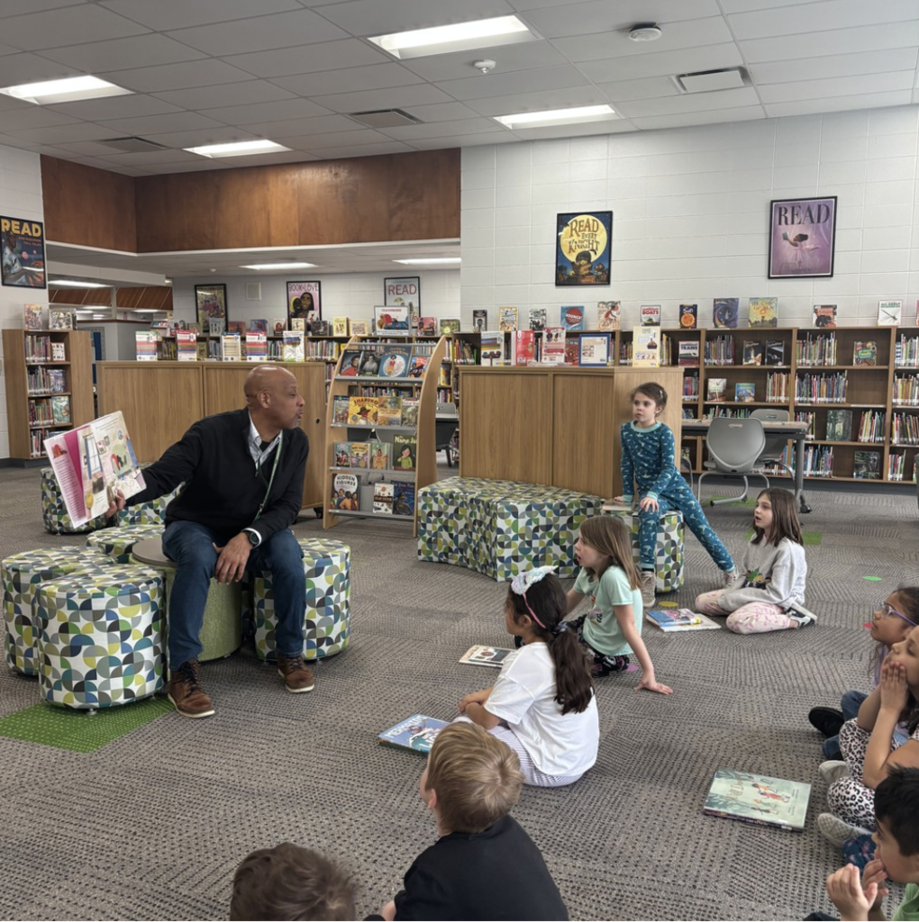 Mr. Brock serves as a guest reader during Read Across America week activities.