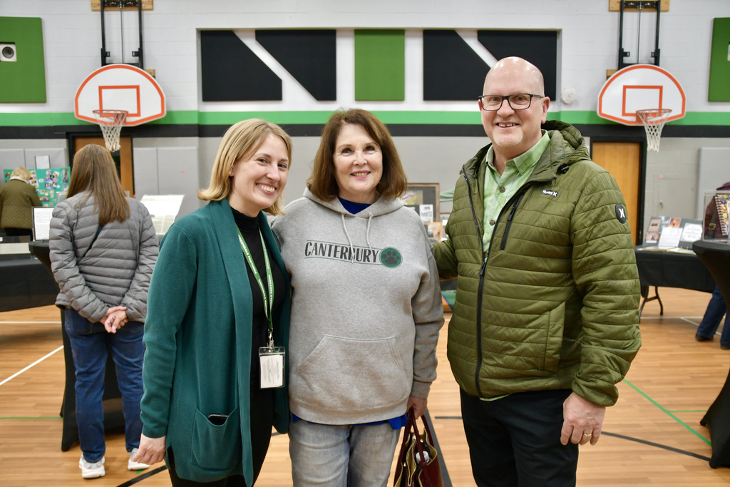 Current Canterbury Principal posing with two past principals at Jubilee Open House.