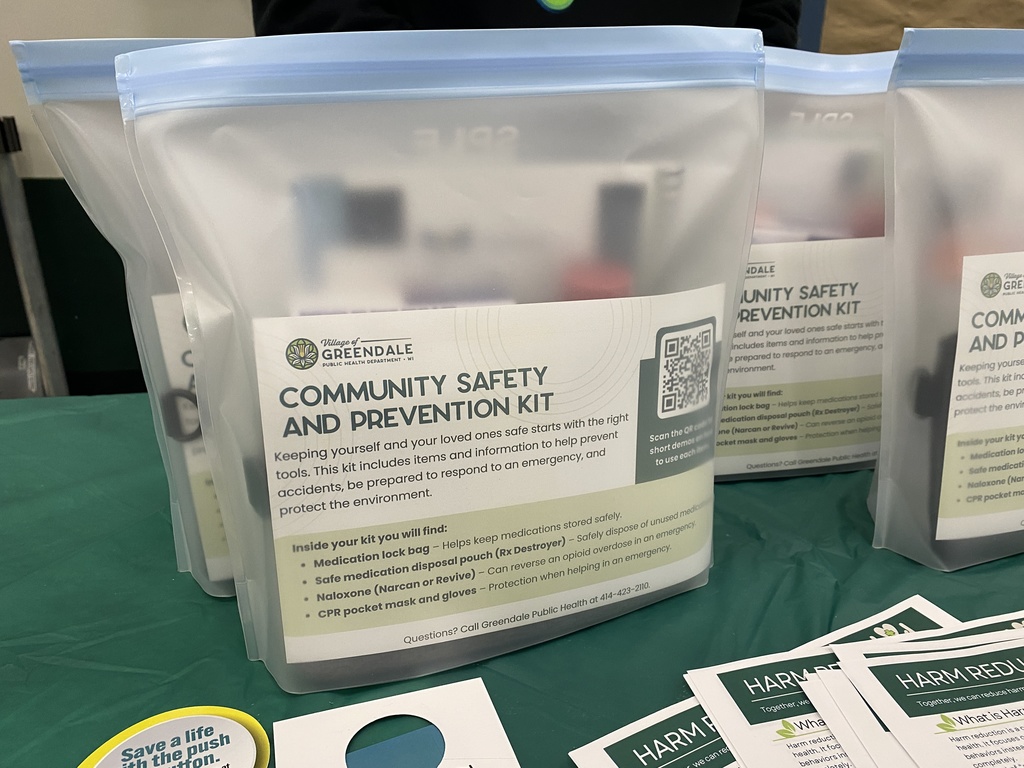 Close up of bags of Community Safety & Prevention Kits at Wellness Event.