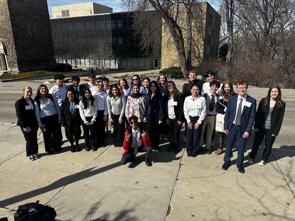 GHS Model UN students posing outside at the conference.
