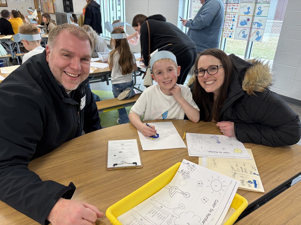 Pigeon Celebration: Boy Smiling with two caring adults.