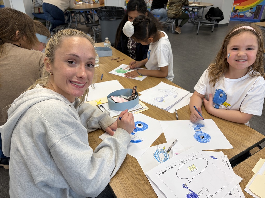 Pigeon Celebration: 5K student posting with a caring adult.