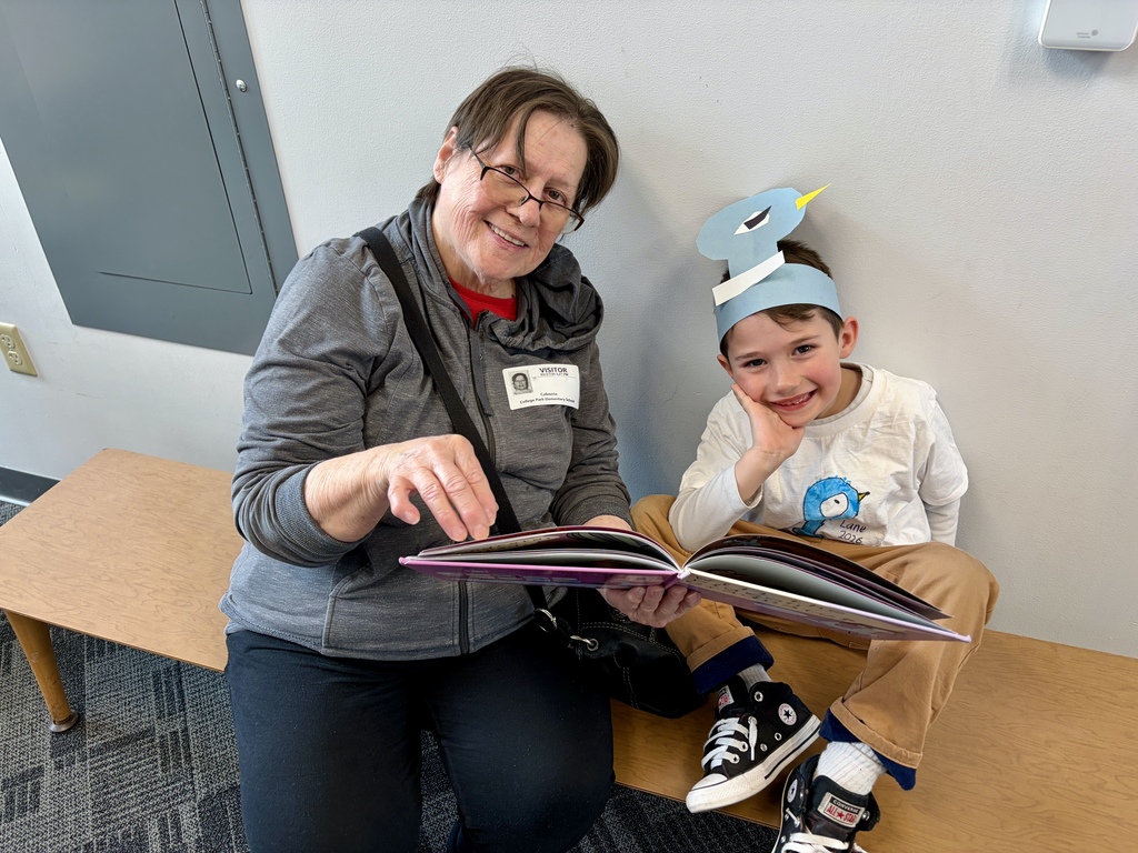 Pigeon Celebration: 5K student posting with a caring adult.