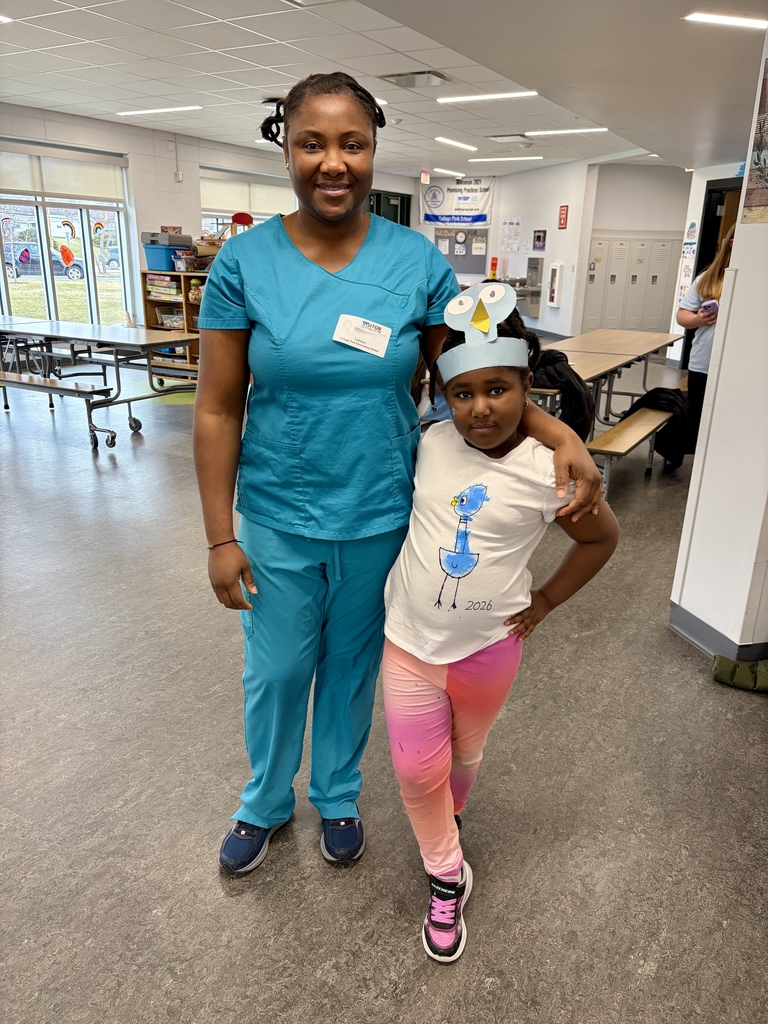 Pigeon Celebration: 5K student posting with a caring adult.