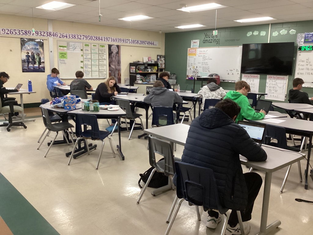 Calculus students in a classroom on a Saturday taking an AP Practice Test.