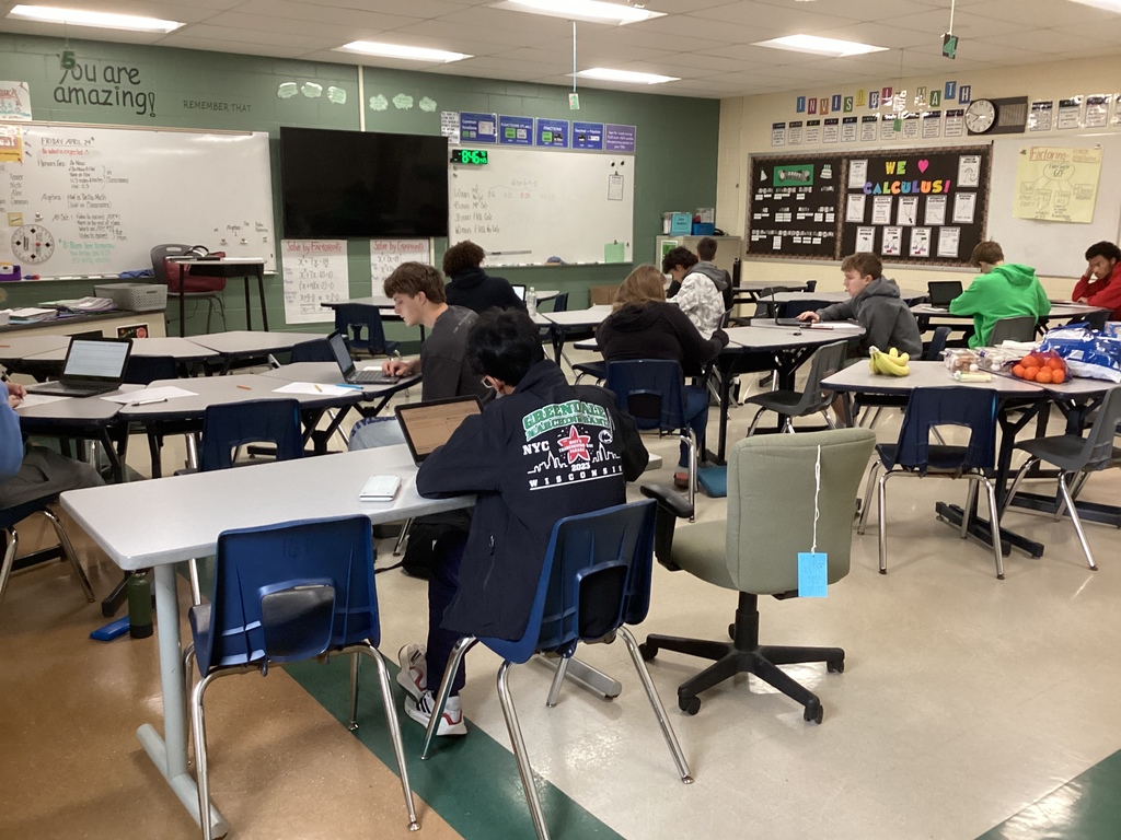 Calculus students in a classroom on a Saturday taking an AP Practice Test.
