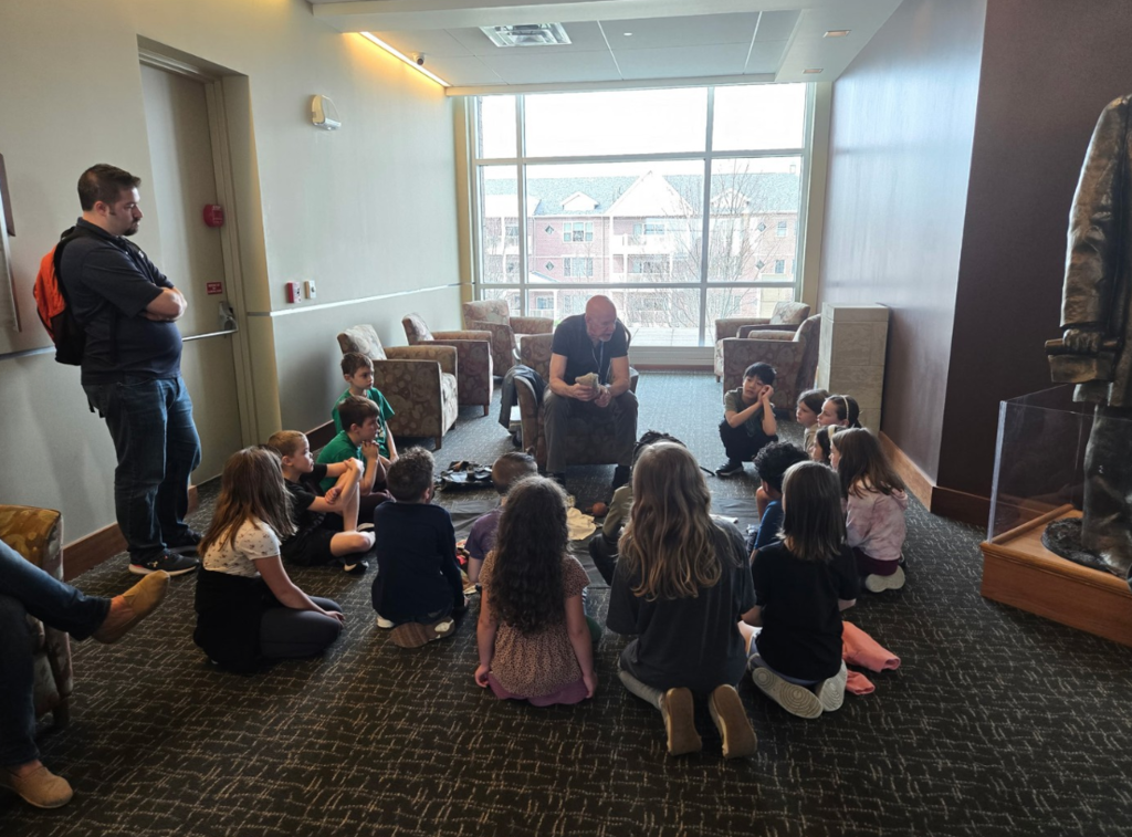 Students listening to a presentation at the Kenosha Civil War Museum.