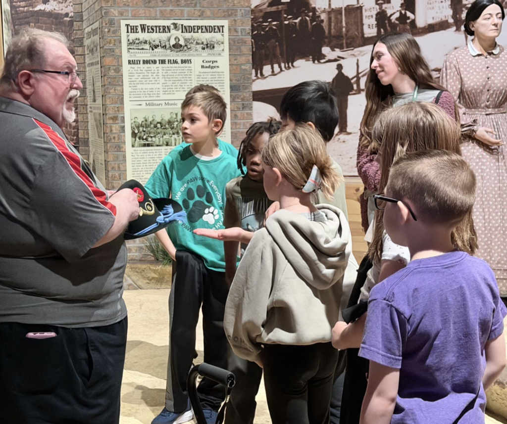 Students listening to a presentation at the Kenosha Civil War Museum.