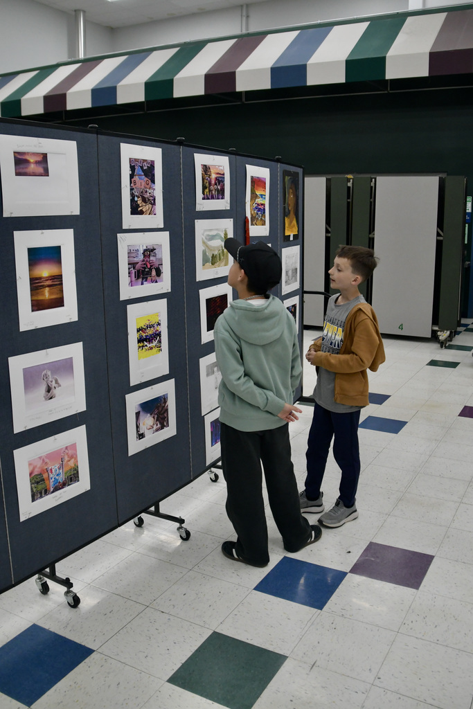 Two students checking out an Art display at Gallery Night.