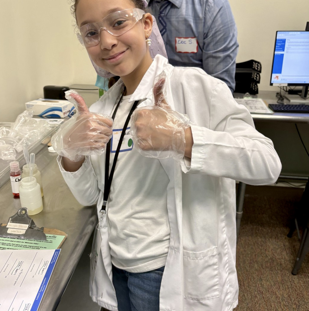 Student working a job at Biztown.