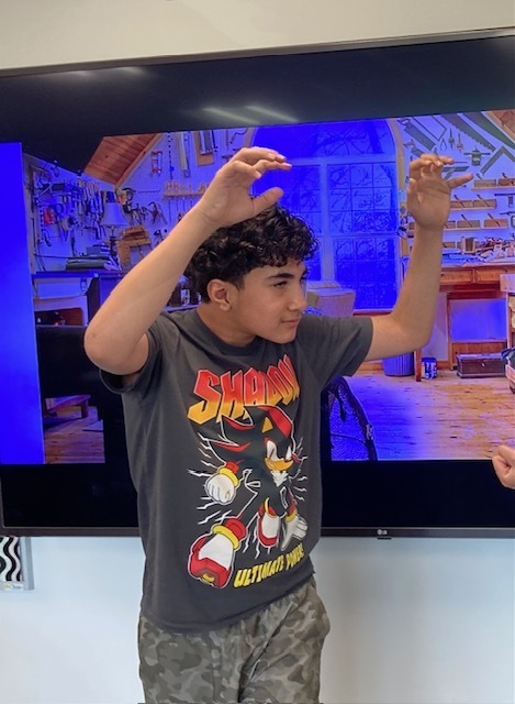 A student acting out a scene from A Midsummer Night's Dream from Shakespeare.