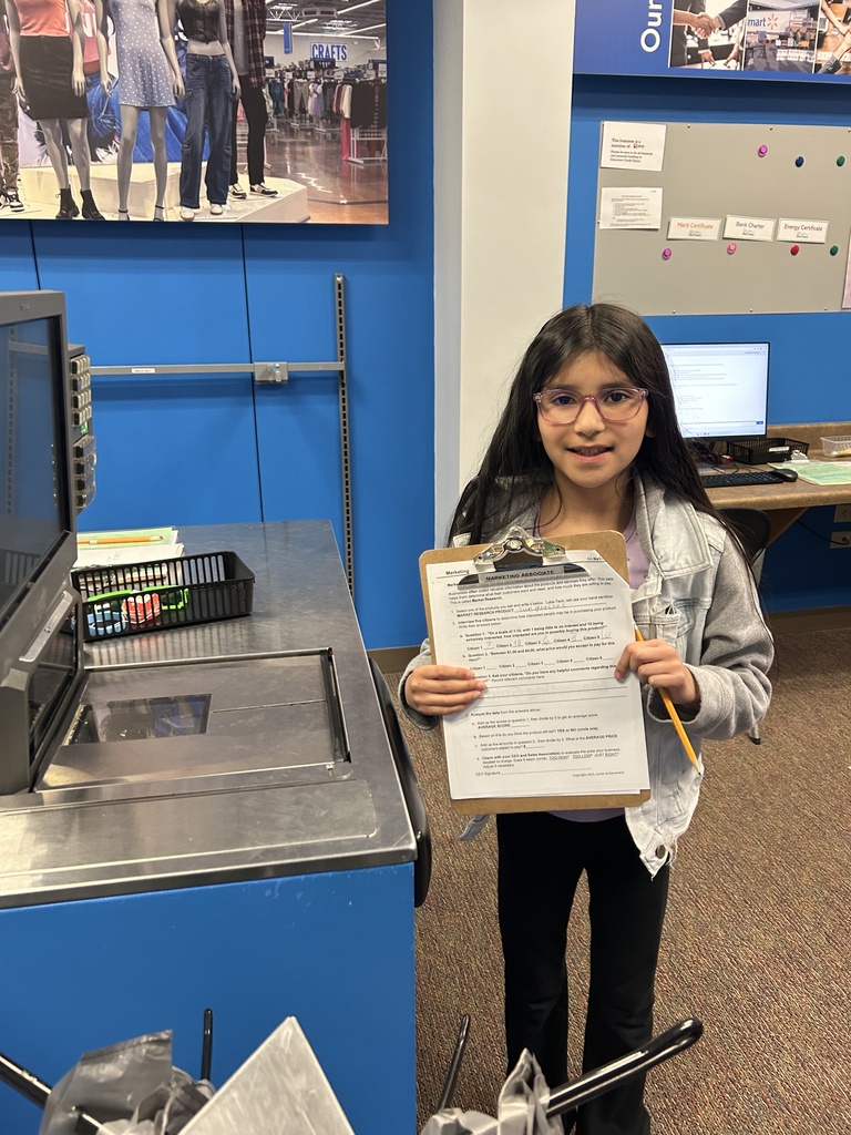 Student working a job at Biztown.