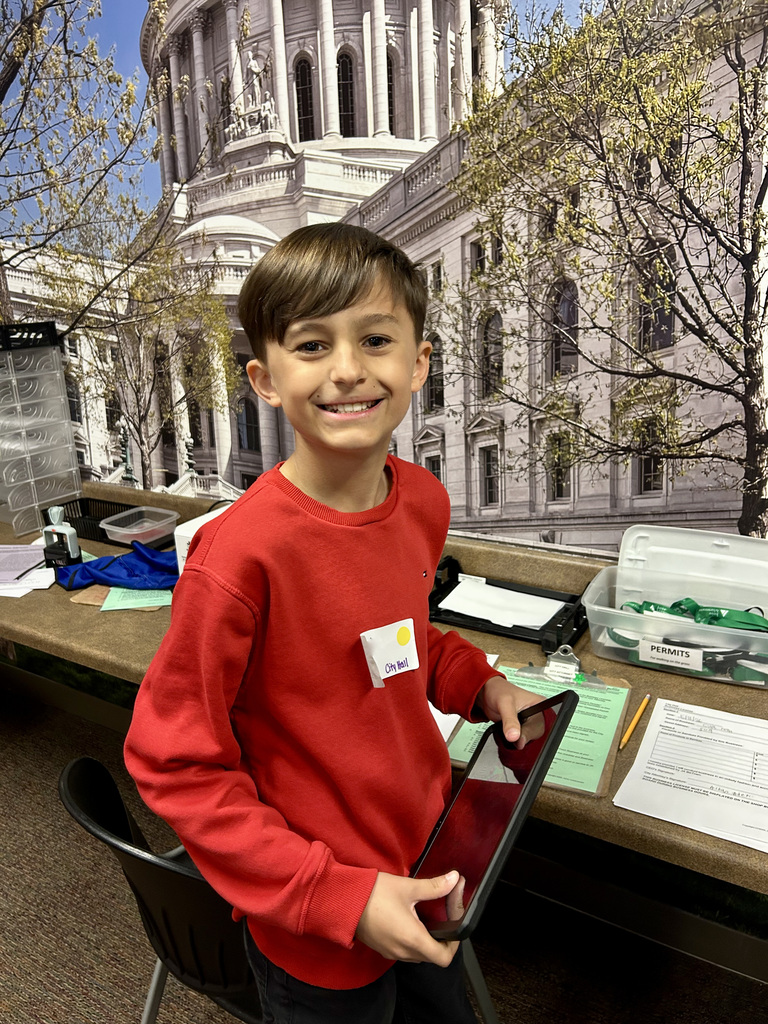 Student working a government  job at Biztown.