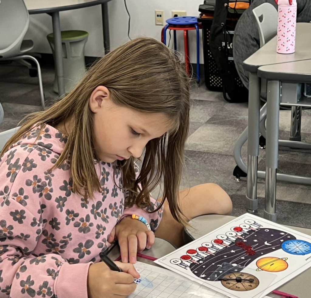 A third grader uses a fun, new game to learn subtraction facts.